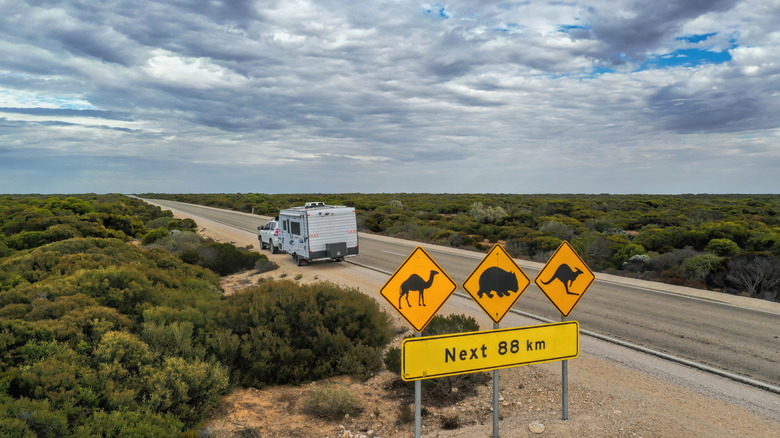 a camping van at the side of the road in the Australian outback
