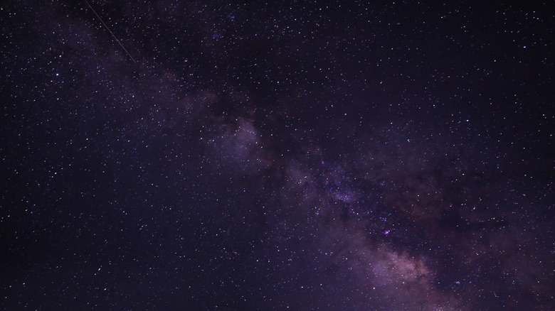 The Milky Way across a purple sky in Oregon.