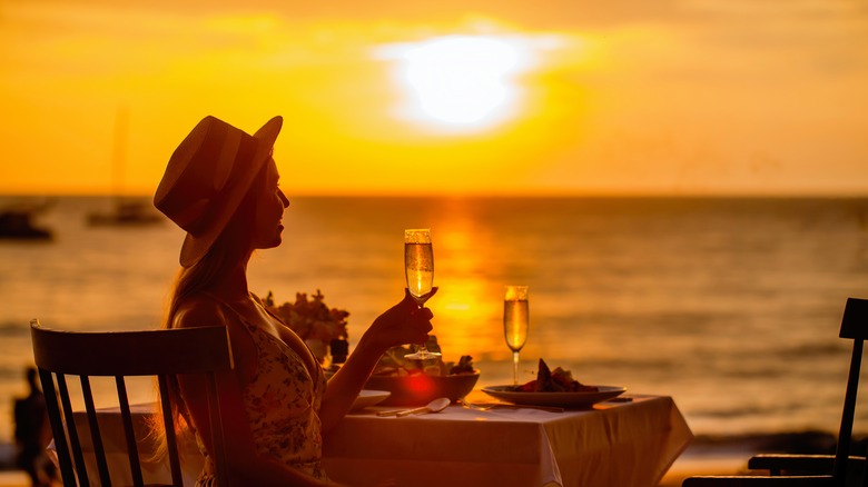 female diner sunset outside