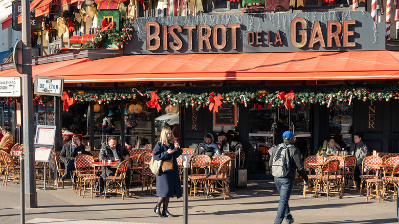 People enjoying their meals outside Bistrot de la Gare in Paris.