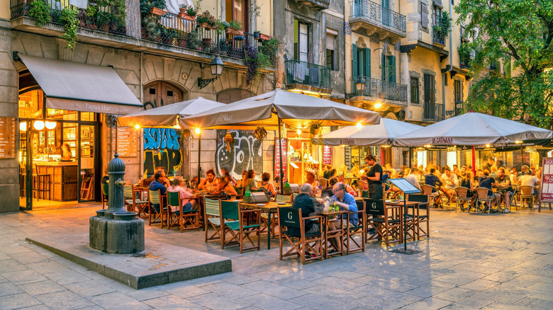 Outdoor tapas restaurant in a small square in Born district in Barcelona, Catalonia, Spain