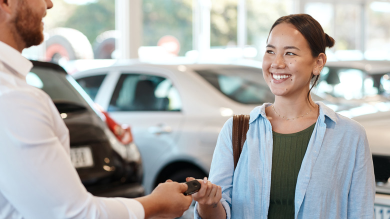 Woman renting a car