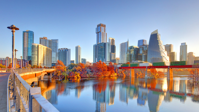 Austin, Texas city skyline during fall with bright leaves