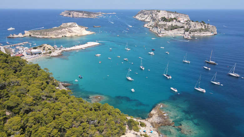 Small islands and boats in a blue sea