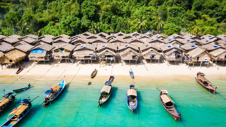 Aerial view of Moken Village and longtail boats