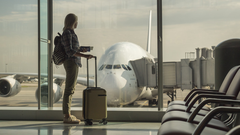 Woman with carry-on bag