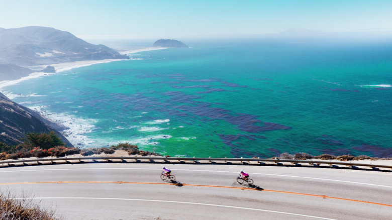 Two cyclists on Highway 1 by Big Sur