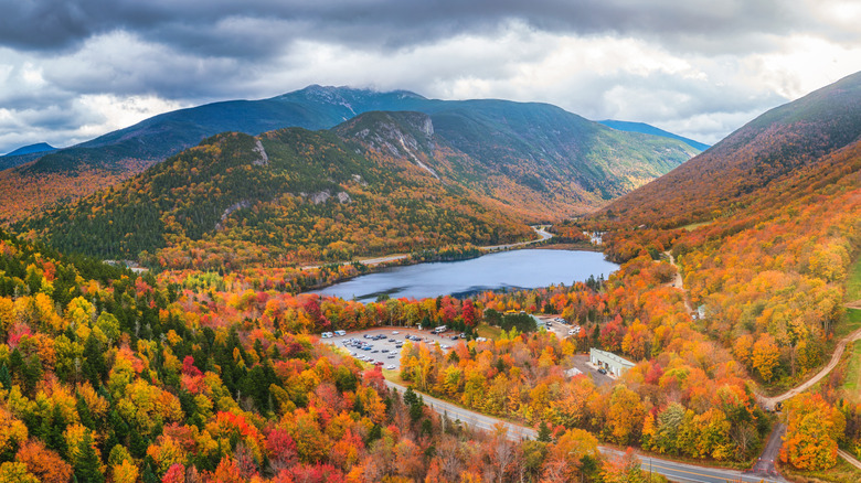 Lake at Franconia Notch State Park with surrounding fall foliage