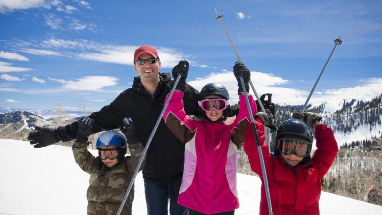Father and three kids at Park City ski resort