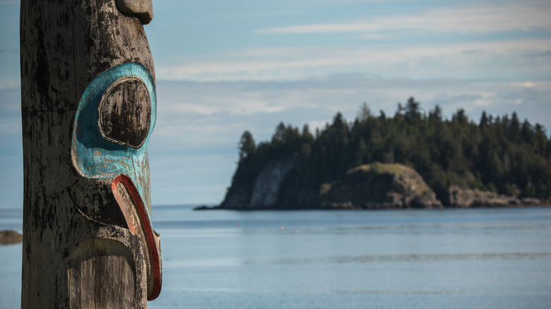 totem pole and island with sea