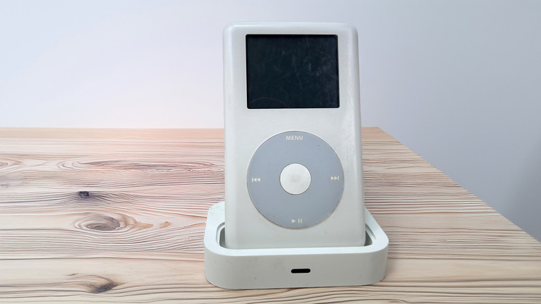 An iPod attached to a charging dock