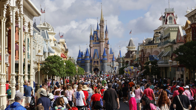 Cinderella Castle crowded Main Street USA