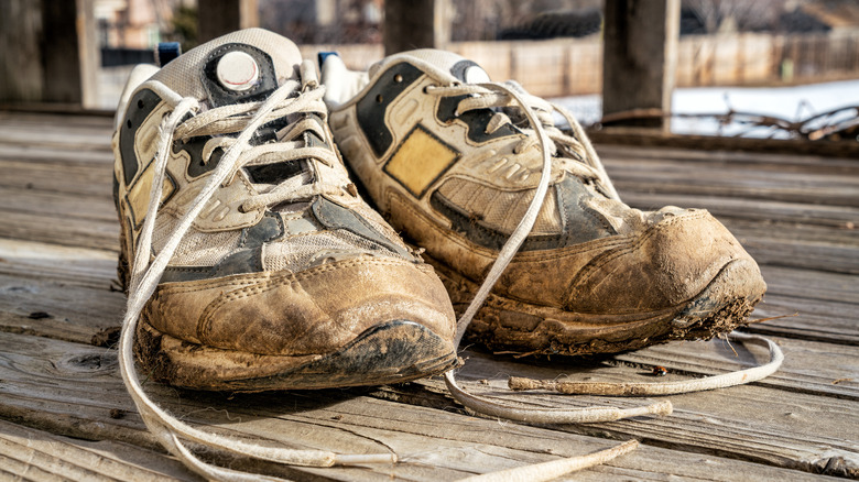 old muddy sneakers