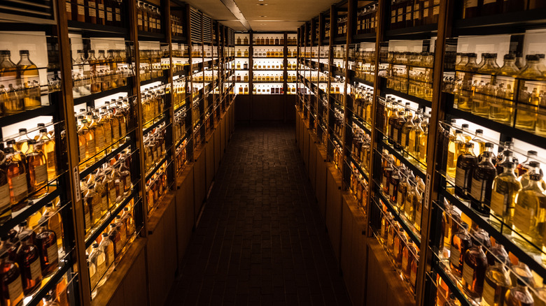 Rows of whisky bottles in the 'library' at Yamazaki distillery