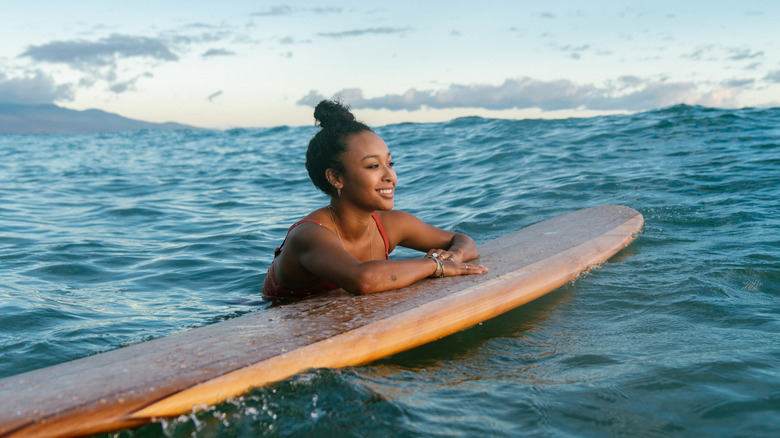 Happy surfer in water