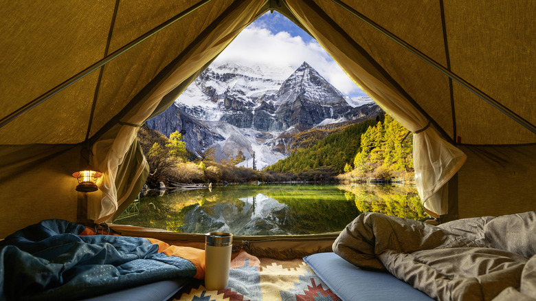 View from inside a camping tent looking at mountains