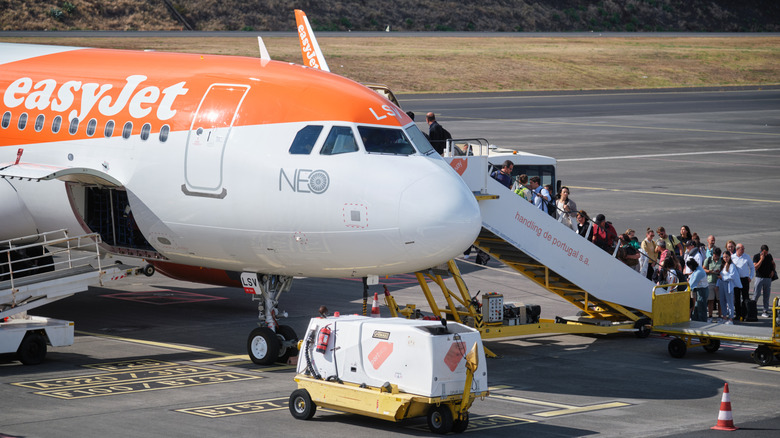 passengers boarding easyJet plane