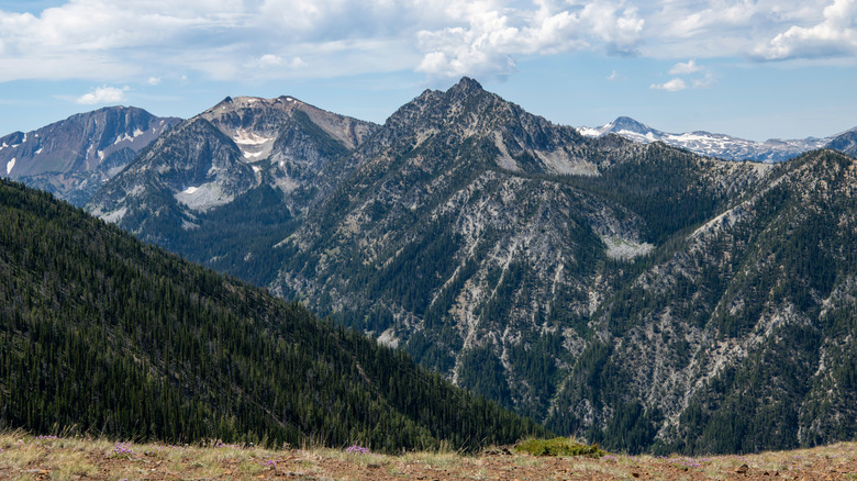 mountain peaks, light snow, clouds