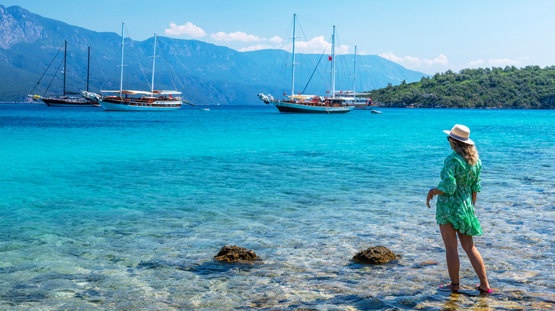 Woman wading in water