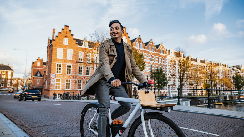 Happy cyclist in Amsterdam Netherlands