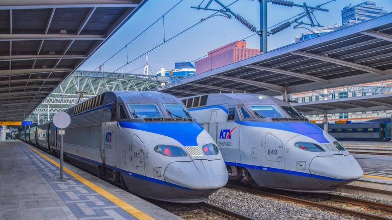 Two bullet trains on the track at station