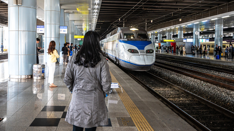 People waiting on train platform