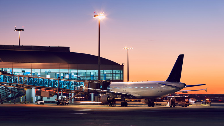 An airplane sitting at the ramp ready for boarding.