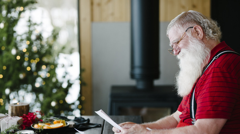 Santa overlooking his letters