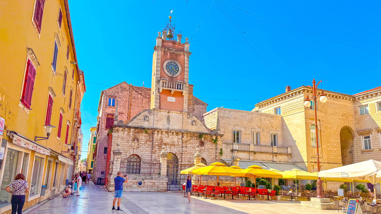 Historic buildings with tables and chairs