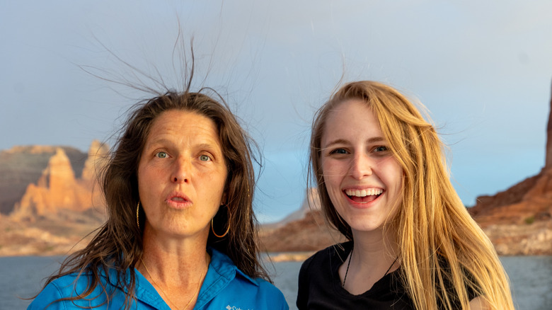 two women outdoors with static hair