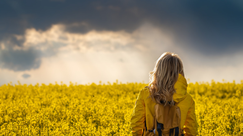 hiker watching storm get closer