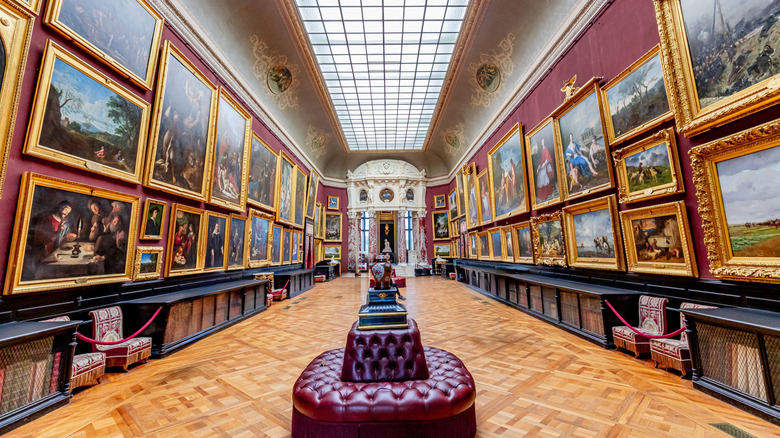 antique paintings line the walls of the Condé Museum withing Chantilly Castle