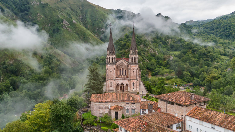 The Covadonga Sanctuary surrounded by mountains in Northern Spain