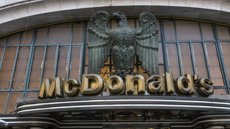 McDonald's sign with eagle sculpture in Porto