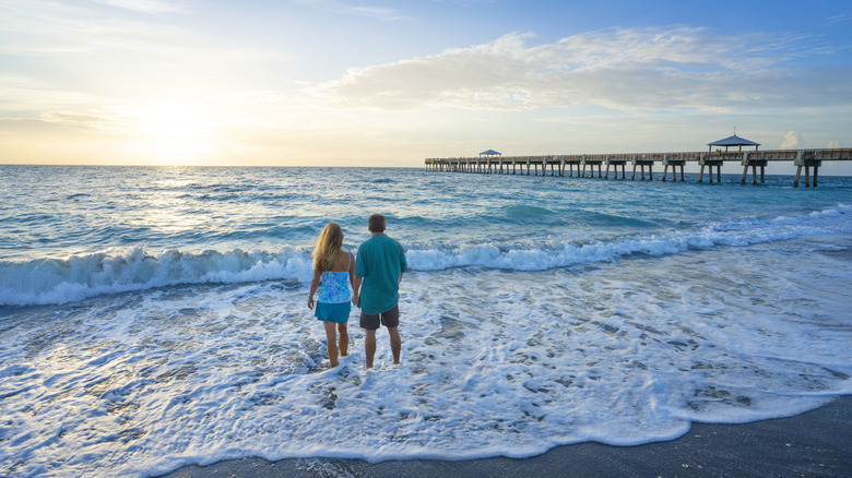 People walking on the beach in Juno Beach, Florida, USA