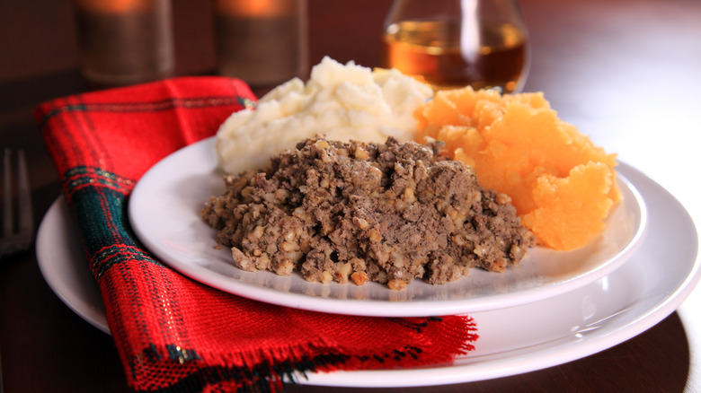a plate of haggis, neeps and tatties