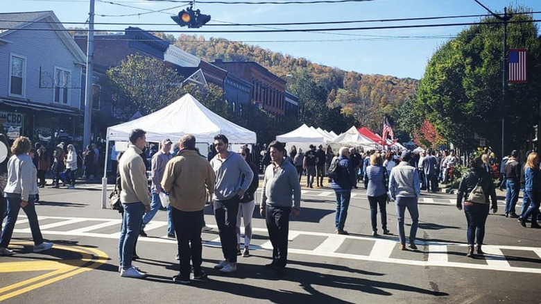 People enjoying the shops at Ellicottville Fall Festival.