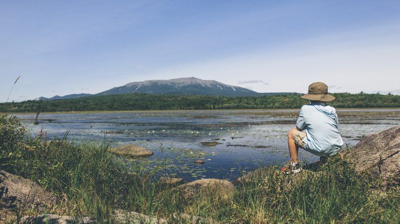 Boy looking out at Mount Katahdin