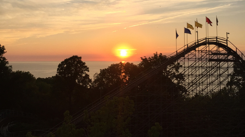 Rollercoaster overlooking Lake Erie at sunset