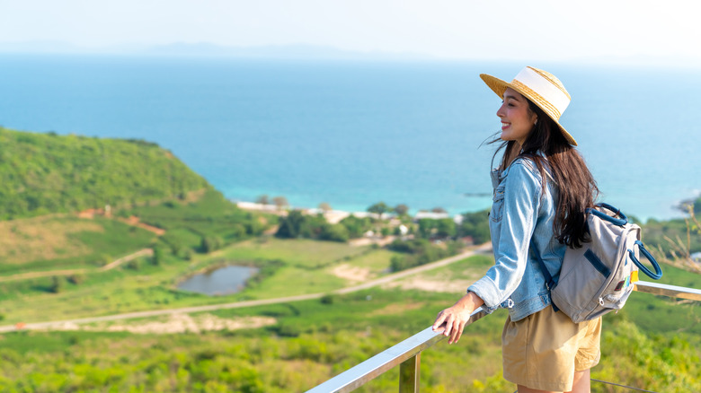 A solo female traveler on a quiet scenic hike