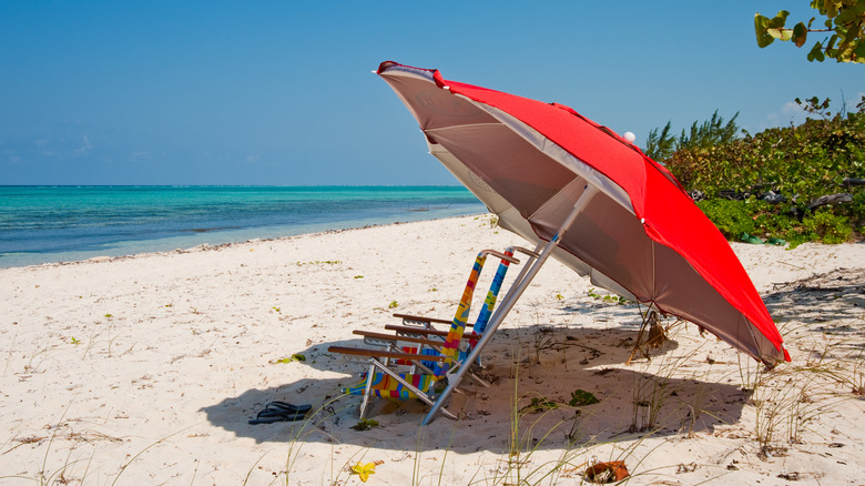 Beach umbrella and chairs on the sand in Barker's National Park
