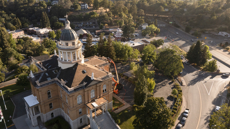 Looking down on an elegant building surrounded by trees in Auburn, California