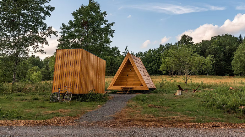 A Lushna cabin with a fire pit at Eastwind Windham in the Catskills of New York