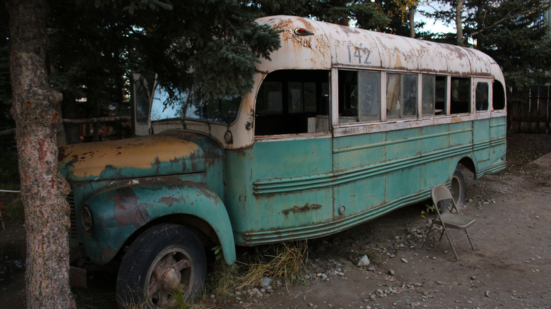 The bus used to film "Into the Wild" is parked under trees