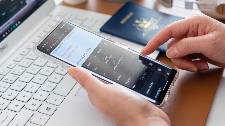 person booking Qantas flight