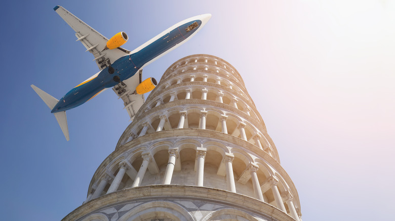 Plane flying, Tower of Pisa