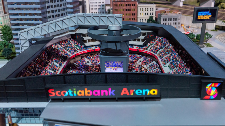 Miniature Scotiabank Arena with people inside at Little Canada