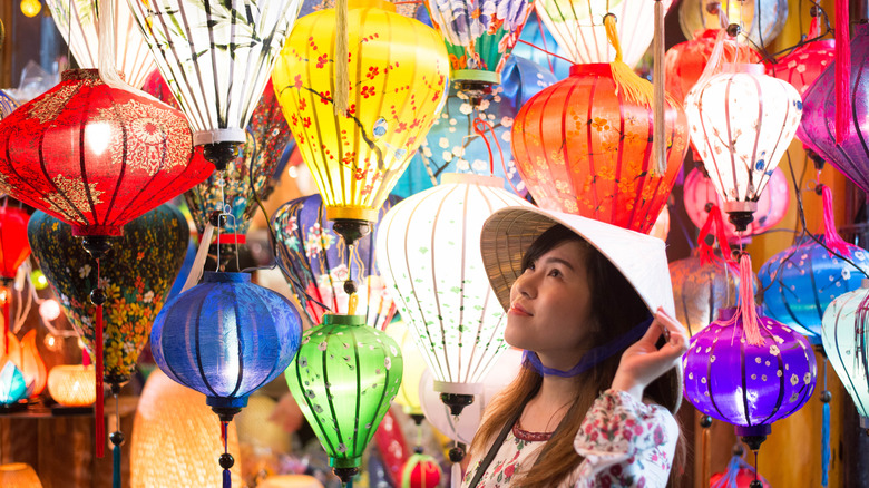 Woman looking at lanterns