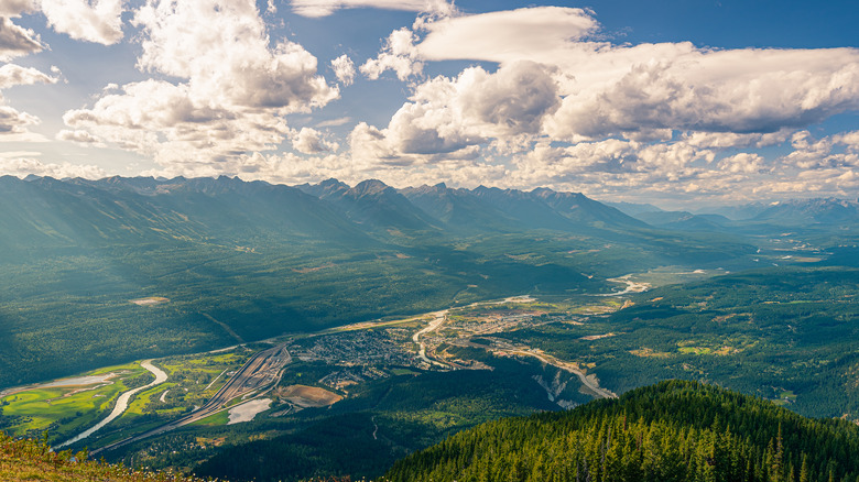 View from a mountain overlooking a valley with a small town