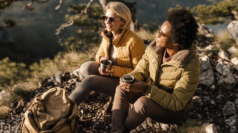 Two women drinking coffee